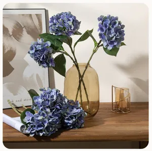 Blue artificial hydrangea flower branch detail view for home decor and wedding floral arrangements.