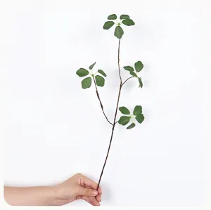 Künstlicher Lotusblatt Zweig Detail, Zen Blumenarrangement, realistische grüne Pflanzenstiele.