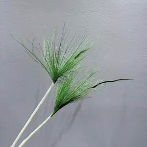 Artificial fountain grass detail, green floral stem, fluffy texture, natural decor