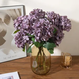 Artificial purple hydrangea flowers in glass vase for home decor wedding table center