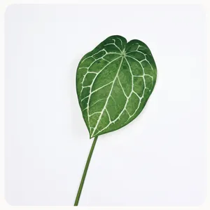 Artificial Anthurium leaf detail shot, realistic green foliage with white veins for decor.