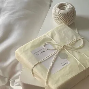 White DIY packaging cotton rope and yarn ball detail, perfect for handmade gift wrapping and tags.