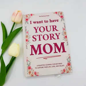 Detail view of the mother story journal with floral cover and elegant typography design.