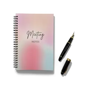 Spiral meeting notebook with colorful gradient cover and elegant black fountain pen detail.