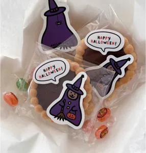 Halloween witch shaped self-adhesive stickers with English speech bubble holiday party decor.