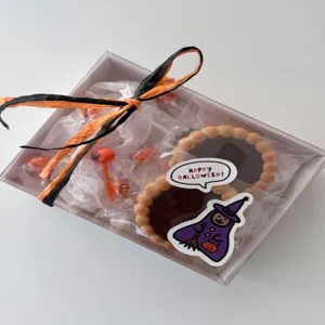 Detailed view of Halloween theme decorative stickers featuring cute witch and speech bubble designs.