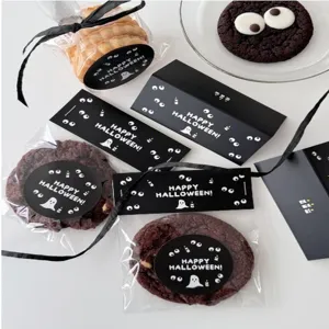 Halloween ghost eyes packaging header cards and sticker set for holiday gift cookie bags detail view.