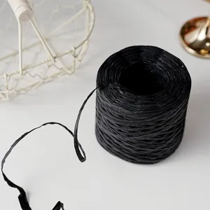Black paper rope detail shot, ideal for DIY gift packaging, crafting, and decorative wrapping.
