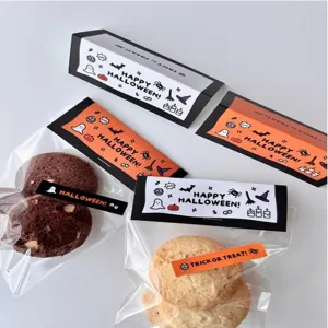 Σετ καρτών συσκευασίας γλυκών Halloween και διαφανών σαkουλών μπισκότων για εορταστικά πάρτι.
