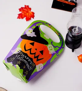 Halloween party handheld pumpkin candy paper box detail view, creative festival gift packaging.