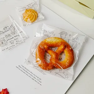 Bolsas de embalaje de galletas transparentes autoadhesivas con bonitos estampados de repostería.