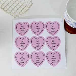 Cute pink heart sticker sheet with bow design, 9 pieces per pack, perfect for journal decorating.