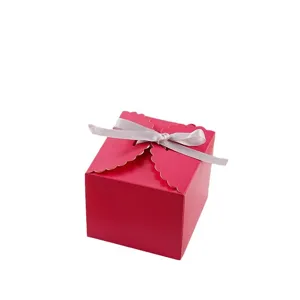Red gift box with silver ribbon, perfect for wedding candy, birthday party, and party packaging.