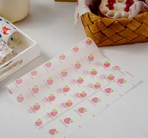 Cute strawberry greaseproof baking paper sheets for sandwich, hamburger and bread packaging.
