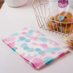 Sachets de biscuits givrés en plastique emballage alimentaire à pois roses et bleus