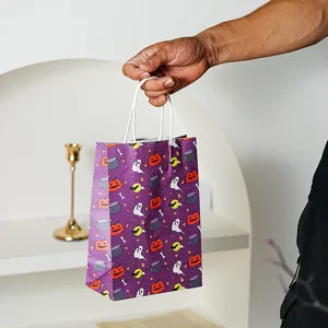 Halloween paper gift bag with cute pumpkin and ghost print, perfect for party treats and candy.