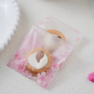 Frosted cookie packaging bag with pink cherry blossom pattern for gift and bakery use 100pcs