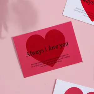 Valentine's Day love greeting card detail, romantic red heart print and sweet message.