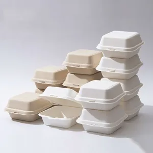 Disposable eco-friendly paper pulp hamburger boxes, biodegradable takeout containers.