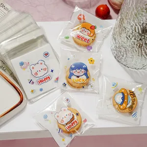 Sachets autocollants de dessin animé pour emballage de biscuits et petits bijoux.