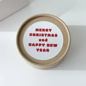 Kraft paper gift box with Christmas greeting sticker, round holiday decorative packaging