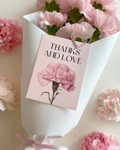 Detailed view of Mother's Day carnation greeting card with THANKS AND LOVE text.