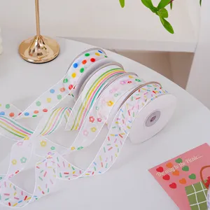 Rubans cadeaux transparents colorés avec de jolis motifs à pois et floraux pour la déco DIY.