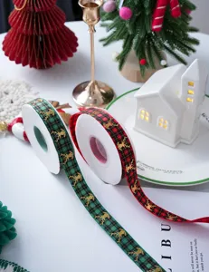 Christmas plaid ribbon with gold reindeer print, perfect for holiday gift wrapping and DIY crafts.