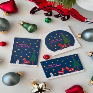 Set de cartes de vœux de Noël, charmant design de cerf et bonhomme de neige pour cadeaux.