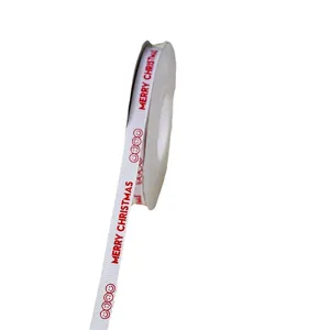 1cm wide Christmas gift wrapping ribbon white fabric with red merry christmas text and smile faces