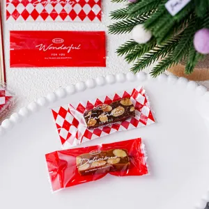 Kerst snoepzakjes voor noga en toffee, rood ruitjesontwerp, 100 stuks verpakking.