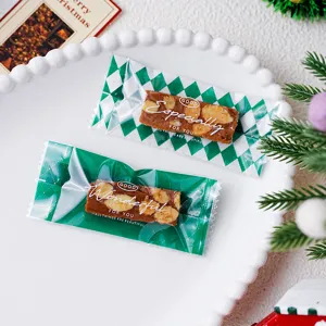 Kerst noga toffee snoep verpakkingszak, groene ruit machine zegel buidel, detailweergave.