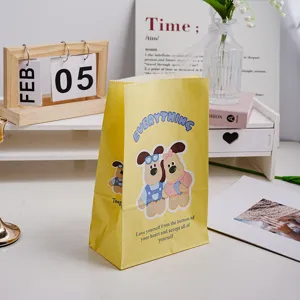 Cute cartoon yellow paper gift bag with inspirational quote for party and holiday packaging.