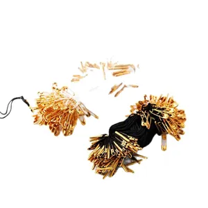 Black and white hang tag strings with gold safety pins for clothing labels and DIY crafts.