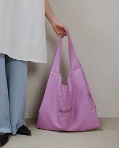 Large capacity purple soft leather tote shoulder bag with Success print for casual wear.