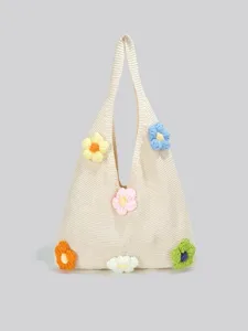 Beige Strick-Shopper Tasche für Damen mit bunten Häkelblumen, lässige Umhängetasche für den Alltag.