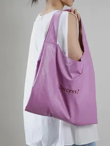 Stylish purple soft leather tote bag for women, slouchy casual shoulder bag for daily use.