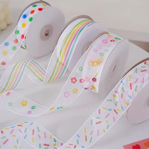 Rubans en organza colore avec des motifs mignons pour emballage de cadeaux divers.