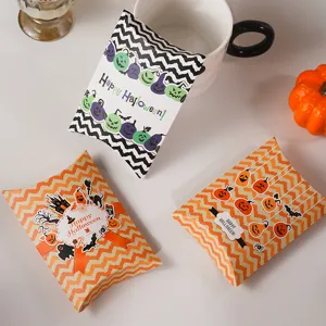 Halloween candy cookie pillow paper box detail view, festive pumpkin bat gift packaging display.