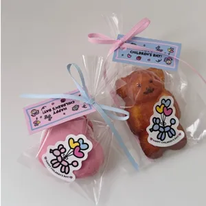 Cute cartoon children's day gift bags with bear cake shape tag and stickers set for students.
