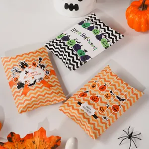 Halloween candy gift packaging pillow boxes set, decorative paper treat boxes for party favors.