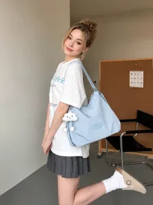 Korean style simple commuter light blue tote bag with cute cloud pendant for daily women use main