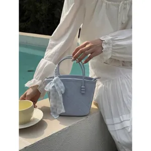 Light blue quilted bucket handbag for women, sweet resort style tote bag with floral scarf.