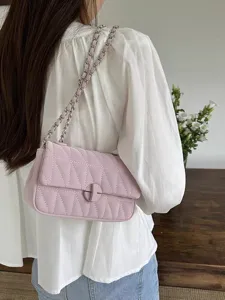 Stylish pink quilted chain shoulder bag detail view, chic underarm bag for women daily commute.