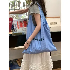 Casual blue striped nylon shoulder tote bag with letter print, spacious daily casual bag.