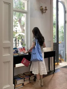 Korean style single shoulder large capacity nylon striped tote bag for women daily casual use.