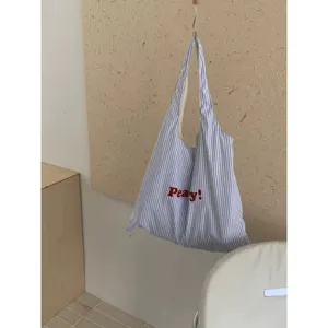 Borsa a tracolla in tela a righe blu e bianche con stampa di lettere rosse, shopper casual.