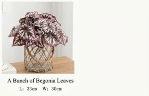 Detailed view of artificial begonia leaves bouquet in a rope-wrapped glass vase for home decor.