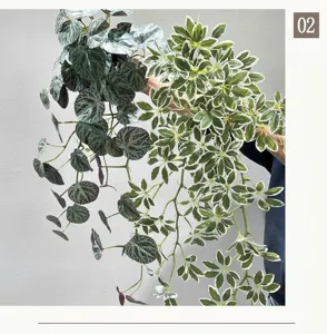 Detailed view of artificial hanging plants foliage vine greenery wall decor for home.
