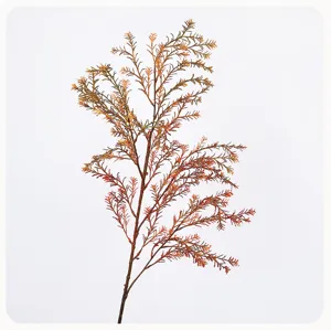 Artificial plant branch detail shot for home decor, wedding floral arrangement and green display.